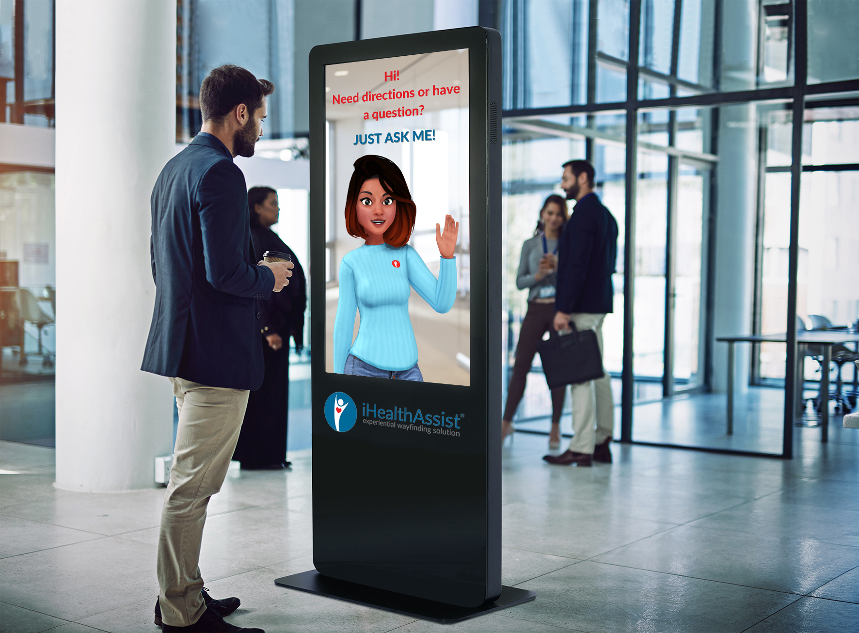 man talking to iHealthAssist in hospital lobby